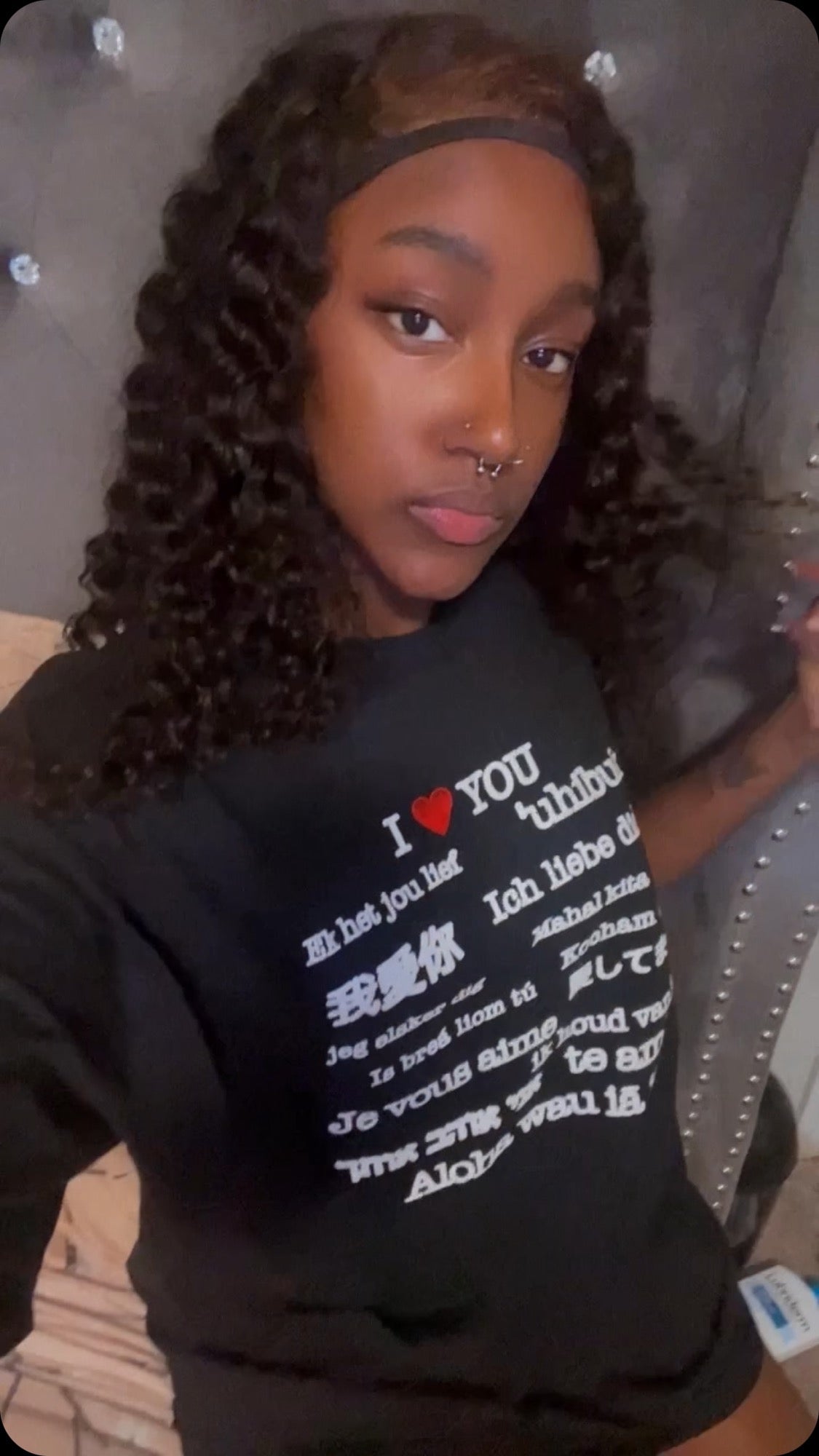 Young woman wearing the I Love You tee
