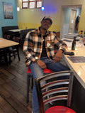 Young man wearing the GHETTO A plaid embroidered garment